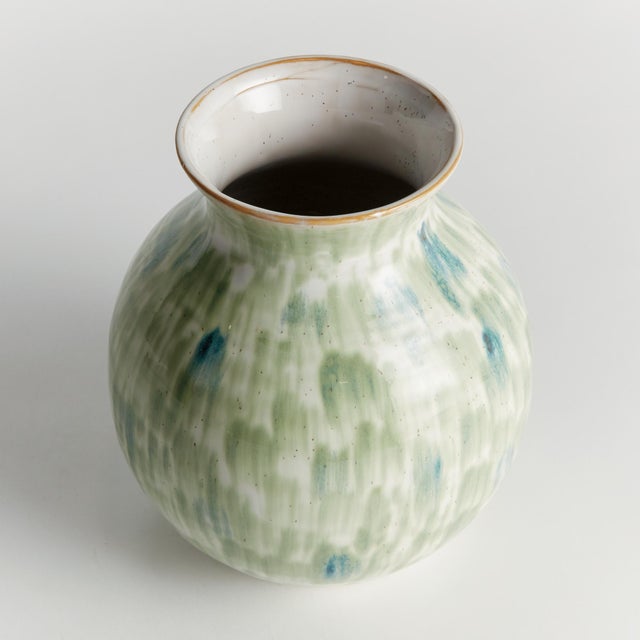 Made of a highfired, durable stoneware using a slip cast mold, a whole lot of artistry goes into this vase. But the real...