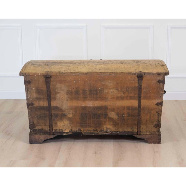 Made in Sweden around 1850, this blanket chest is constructed in pine with a slightly domed top and a hand-painted finish....