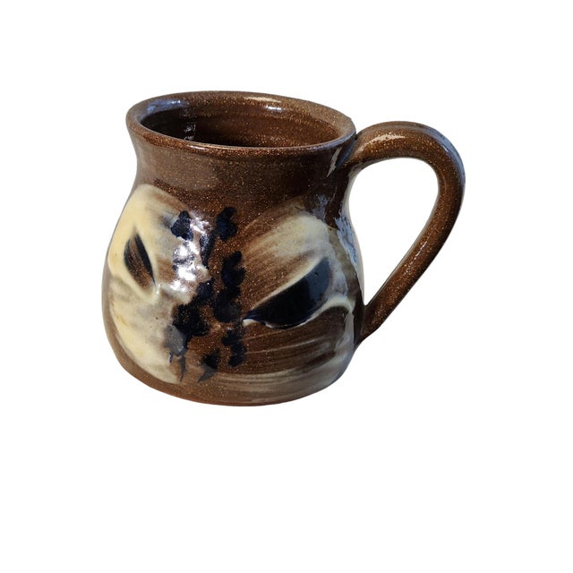 Beautiful diminutive creamer and saucer pair by North Carolina potter Mary Louise Hudson Vickery, both in excellent...