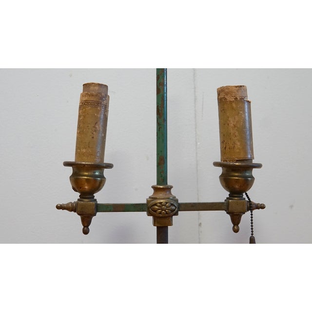 This lamp is an incredible find. It is an antique, and it is waiting for the next owner with imagination to restore it and...