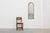 Elegant Venetian-style wall mirror from Italy, distinguished by its tall, slender proportions and graceful arched...