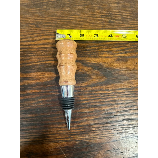 One of a kind liquor or wine bottle stoppers crafted in California. Each wood stopper is meticulously hand-turned on a...