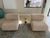 This pair of elegant lounge chairs has simple clean lines, gentle sloping curves and makes a beautiful and sophisticated...
