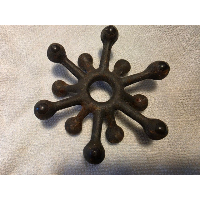 Vintage Mid-Century Modern Cast Iron Sputnik / Starburst Candle Holder Overview Elevate your space with this striking Mid-...