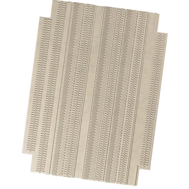 Tapis Menizia #03 is a hand-tufted rug with an eclectic style due to its unique color, pattern, and texture. This...