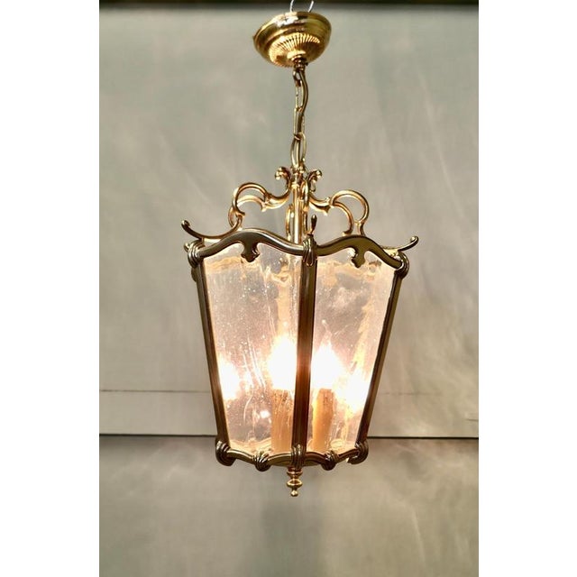 Large French Rococo Style Brass Lantern Hall Light A superb quality heavy brass lantern, the light has 6 glass panels, the...
