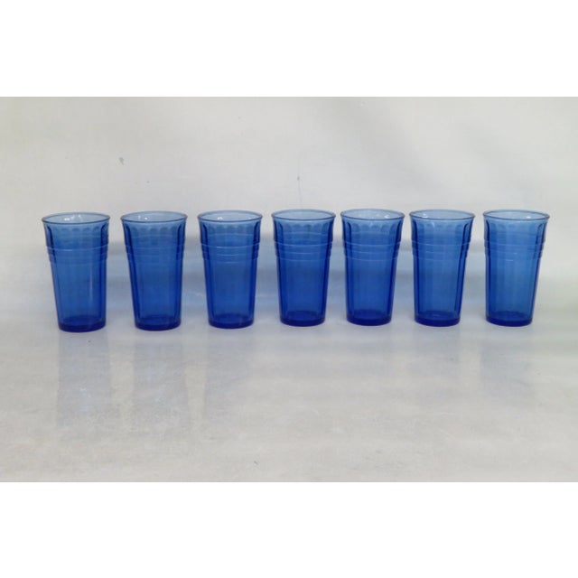 This gorgeous Set of 7 Drinking Glasses has wonderful mid century modern style. Each Cup features a classic silhouette,...