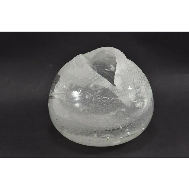 The sculptural vases object glass was ground down by hand fabrication by the artist in his typical honeycomb pattern and...