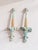 An impressive pair of oversized vintage architectural wall ornaments with Neoclassical and Hollywood Regency influence....