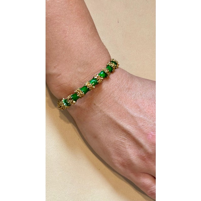 Vintage Enamel Bangle / Bracelet pair one White one Green in 18 Karat Yellow Gold 75 gm It features a bangle style...