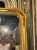 The product is a 19th century French Louis Philippe mirror adorned with intricate flower designs, adding a touch of...