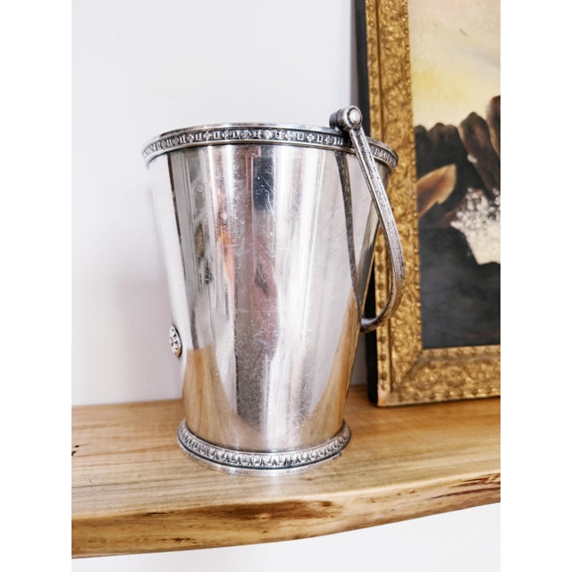 A lovely antique circa 1920s heavy silver plated ice bucket from The Roosevelt Hotel in New York City. In excellent...