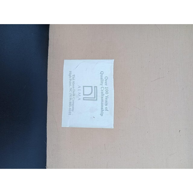 Step back in time with this exquisite and hard-to-find vintage loveseat from the esteemed Alma Desk Company. Known for...