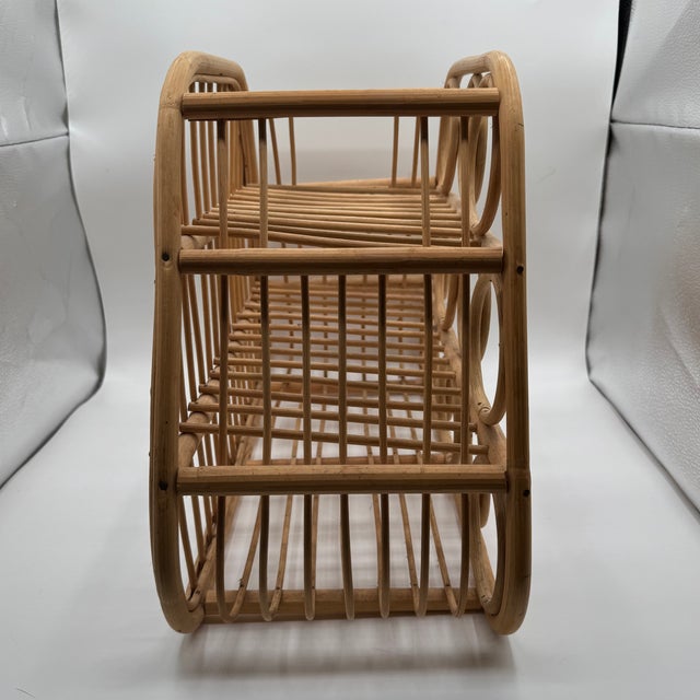 The Lombok wine rack is a handwoven wine rack made from natural rattan and bohemian design. Designed to hold up to 12...