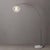 The Float Arc Lamp is a sophisticated lighting solution featuring a Black Nickel steel body and a Sphere White Satin steel...