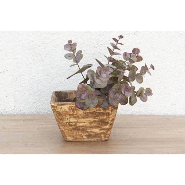 Discover the honest beauty and enduring utility of rural craftsmanship with this charming small vintage wooden bucket....