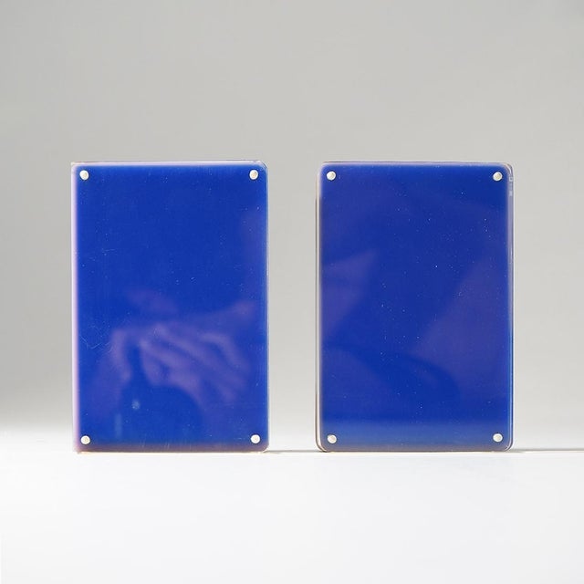 A pair of 1970s photo frames characterised by the combination of transparency and colour, reflecting the experimentation...