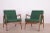 This pair of armchairs was produced by the Polish company Swarzędzka Furniture Factory. The armchairs have been...