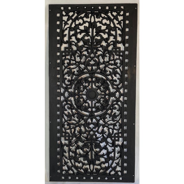 Originally from New York City, this unusually large pair of cast iron floor grates or heat registers are beautiful ornate...
