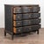 The black painted finish is striking in this attractive large oak chest of four drawers resting on scalloped skirt and...