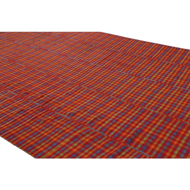 Made with handwoven wool in Turkey circa 1950-1960, this vintage 9x15 kilim is a particularly exciting, rare find in Rug &...