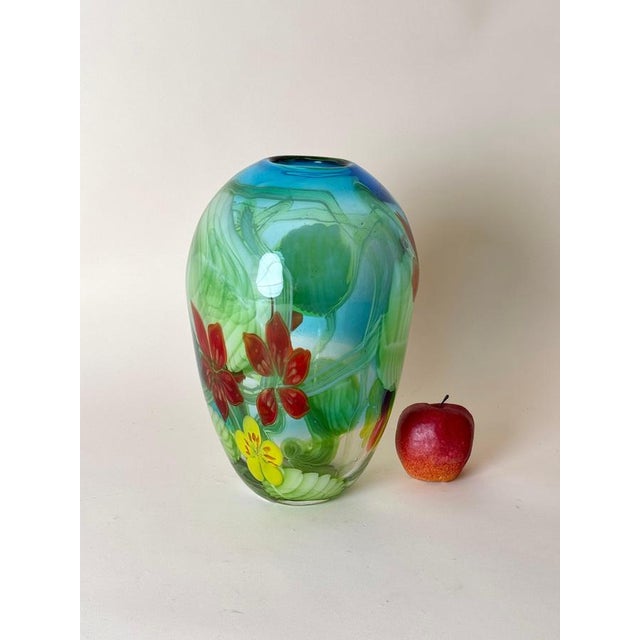 This exceptional Murano glass vase by artist Berit Johansson exemplifies the pinnacle of glass artistry, combining...