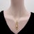 Gold Vintage 14k Gołd Mechanical Slide Trombone Pendant For Sale - Image 8 of 9