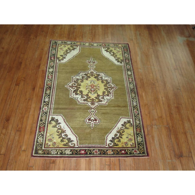 Early 20th Century Olive Brown Yellow Turkish Medallion Ghiordes Rug - 4'6" x 6'6" For Sale - Image 4 of 6