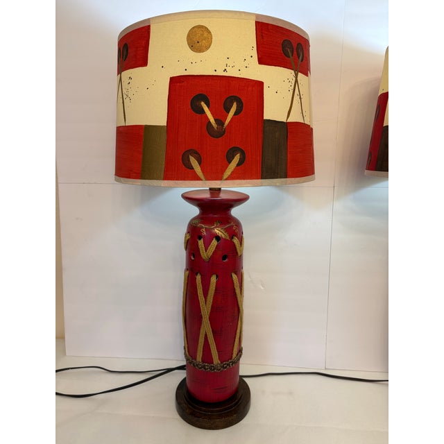 Make a bold statement with this striking pair of vintage Southwestern-style ceramic table lamps. Each lamp features a...