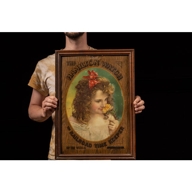 1900s; mfd. by The Meek Company (Coshocton, OH) for Hamilton Watch Co. - Lancaster, PA Antique framed tin litho watch...