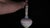 A bulbous lower body tapering into a tall cylindrical neck defines this French unglazed porcelain bottle vase, fitted with...