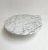 Unique coffee table or side table made of solid white and gray Carrera marble. The teardrop shape of this table is...