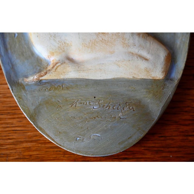 A touch of the Roaring Twenties pervades this charming oval plaster wall medallion, crafted in the pure Art Deco style of...