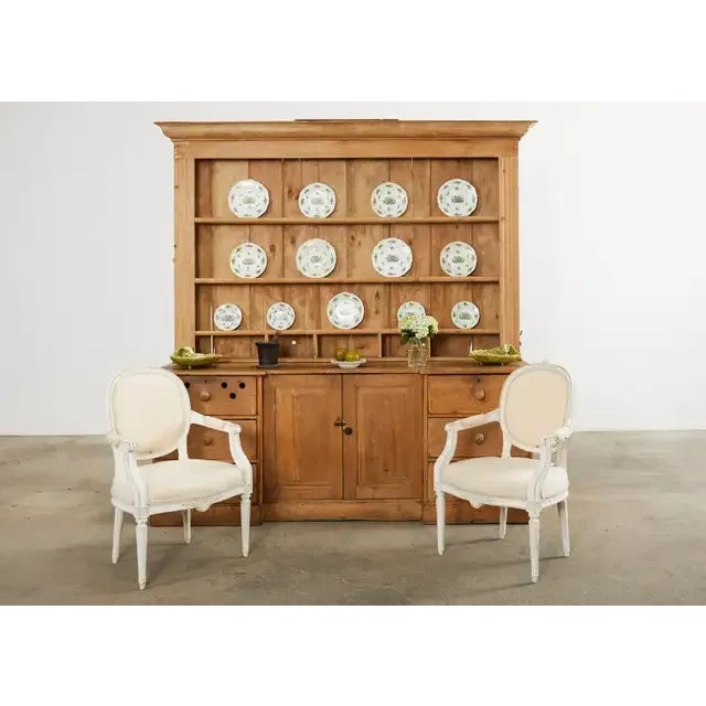Rustic 18th century country French provincial two-part farmhouse dresser with a plate rack and cupboard crafted from 1...