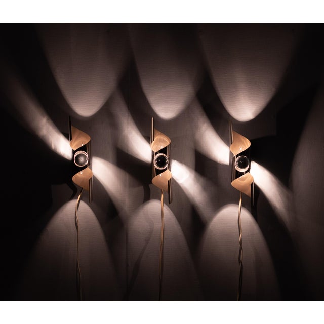 Set of Three Space Ace style ,Wall Sconces .Mocha Brown color . with aluminum . model ''Wokkel'' attributed to Raak...
