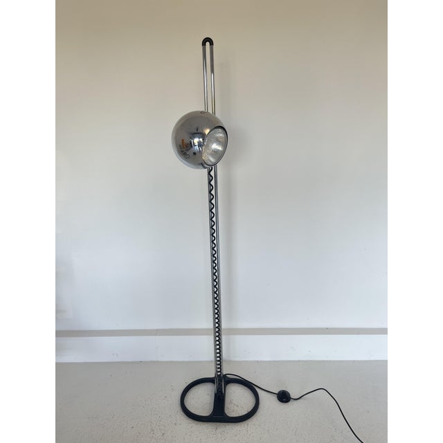 An iconic Space Age floor lamp designed and manufactured by the renowned German brand Staff Leuchten around 1972. This...
