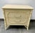 A vintage faux bamboo Dixie nightstand with fretwork and two drawers with original pulls. This style is often called...
