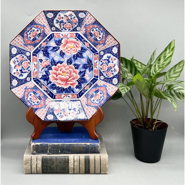 Striking octagonal ceramic platter by Toyo Japan, with pink peonies at the center and bird-and-flower medallions around...