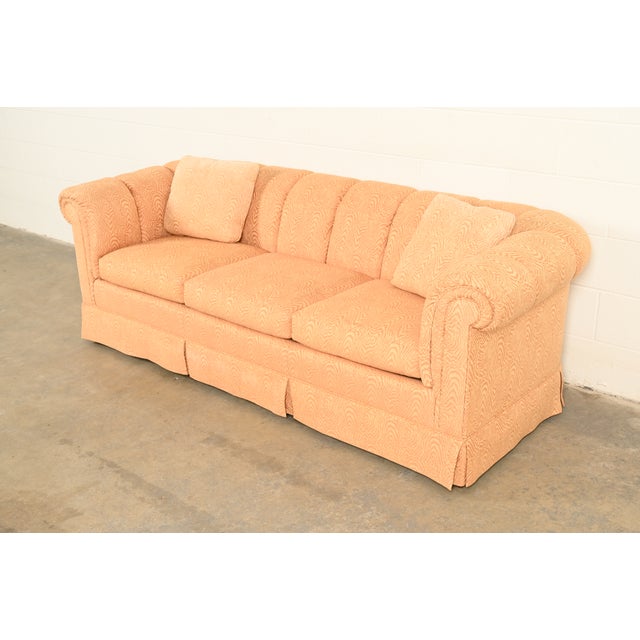 A gorgeous and very comfortable English Traditional custom upholstered three-cushion roll-arm sofa By Baker Furniture USA,...