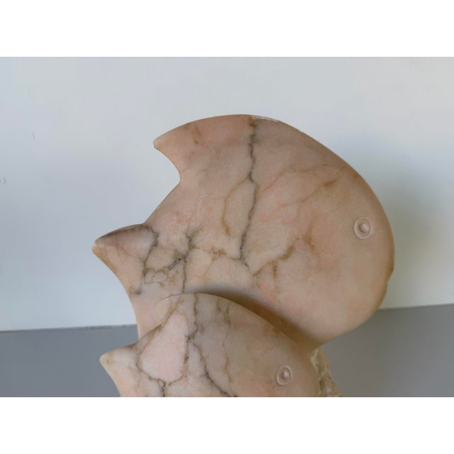 Beautiful 1980’s vintage carved marble fish sculpture featuring two stylized tropical fish. This sculptural piece...