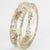 This stunning John Galliano Paris bracelet is from the 2000 Autumn-Winter "Newspaper" collection. The bangle features an...