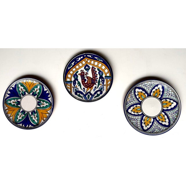 Circa 1950's hand painted Tunisian pottery consisting of the following pieces: (3) Large serving platters (as pictured in...