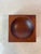 Sculptural mid-century catchall carved from a solid block of rich hardwood, likely teak, featuring a clean square...