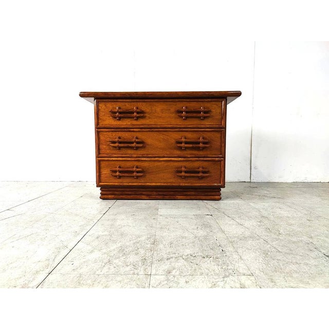 Elegant wooden and bamboo chest of drawers with 3 large drawers. Produced by Maugrion, delivering quality rattan and...