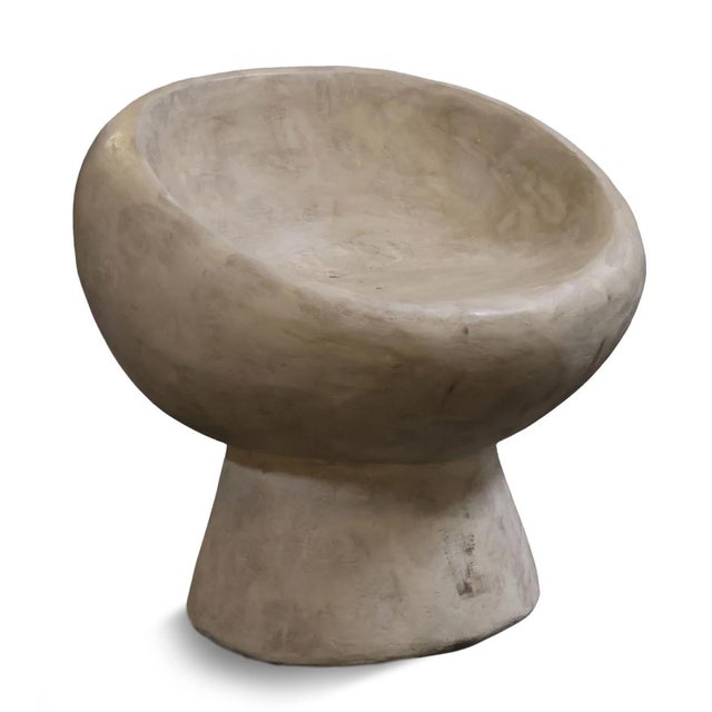 Cement cast organic modern minimalist style chair perfect for outdoor or indoor use. Round shaped seat and pedestal base....