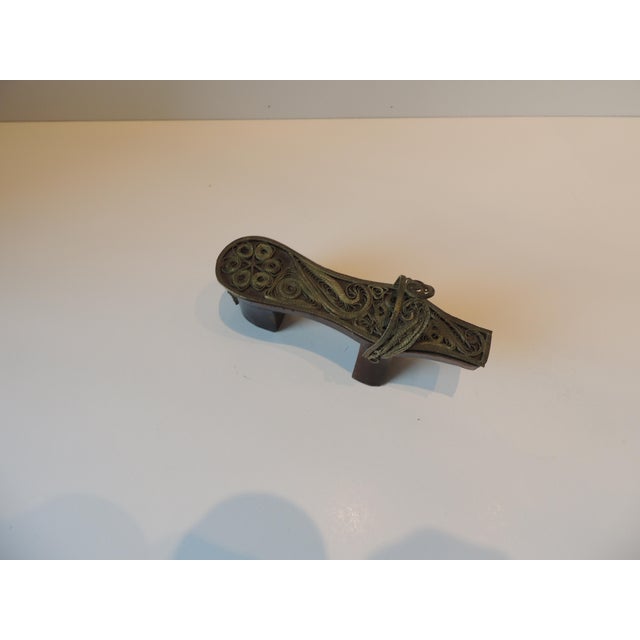 Vintage Indian Carved Wood with Brass Overlaid Details Decorative Object. Paper weight Size: 5.5"L x 1.75"D x 2.5"H