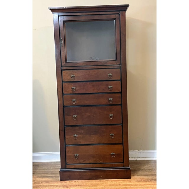 It is an heirloom-quality piece from the French furniture manufacturer Grange, known for its high-quality craftsmanship...