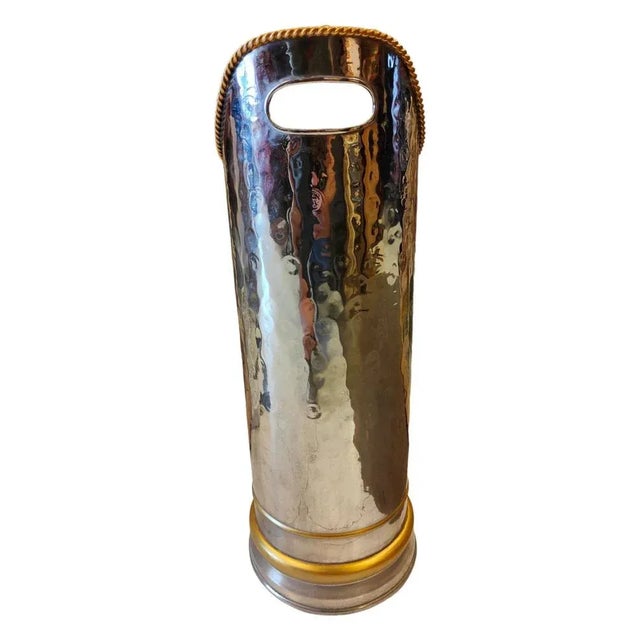 French XIX century umbrella stand in silvered and gilded brass. Excellent condition. Measurements: 56 cm height