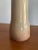 A large vase designed by Jane and Gordon Martz for Marshall Studios in a blush/ rose glaze. Famous for their highly...