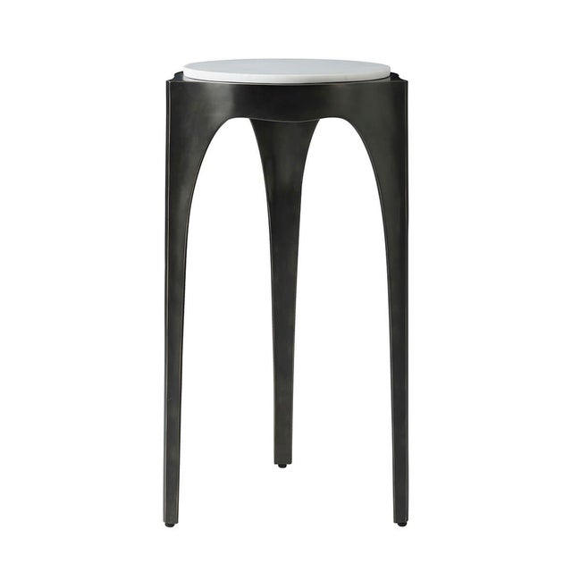 The Accent Table is the ideal piece to accompany your relaxation. The raised marble top is set upon an organic three-...